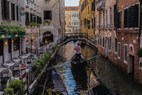 Man Riding a Boat in the Canale